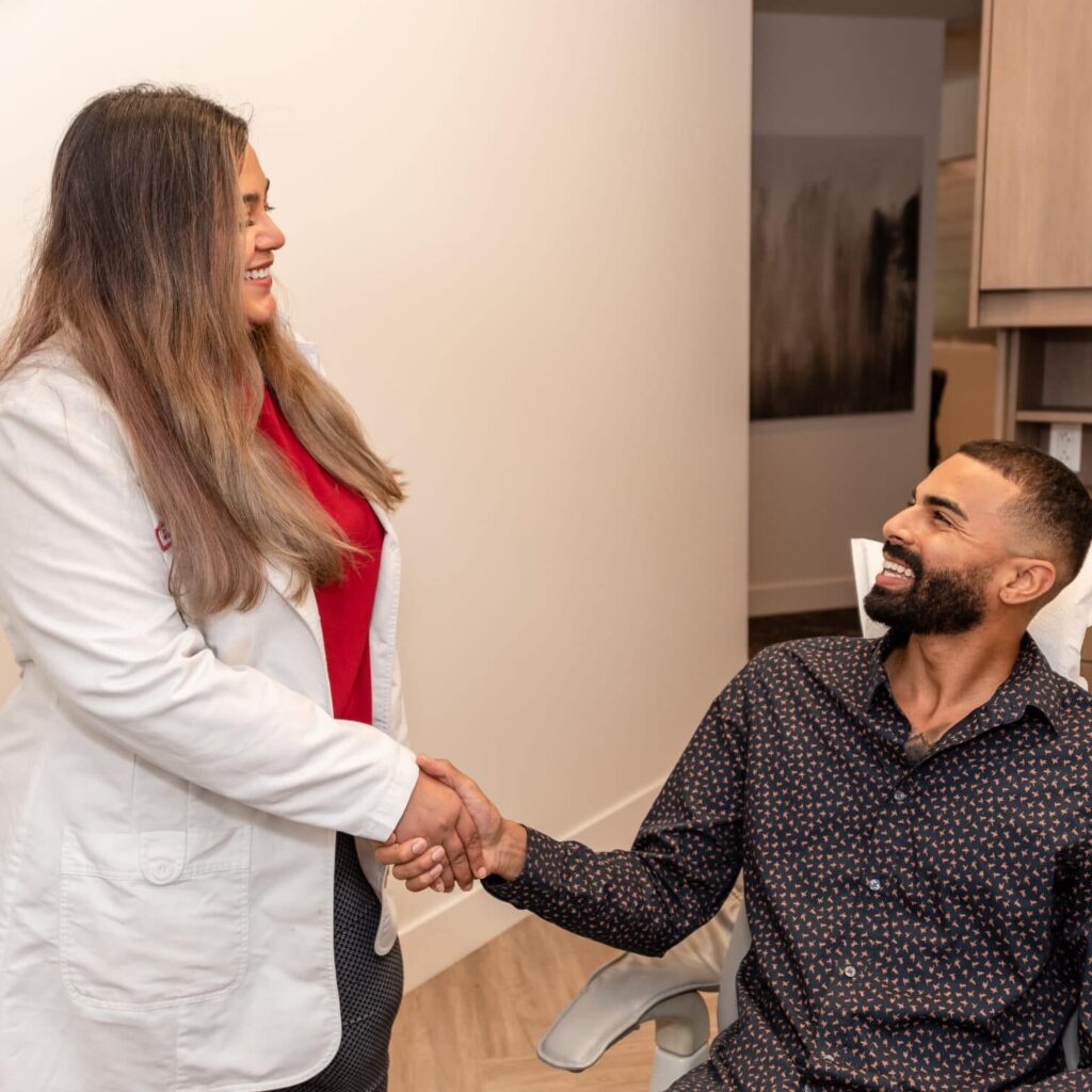 Dentist in Seattle works wit her patient at Innovate Dentistry